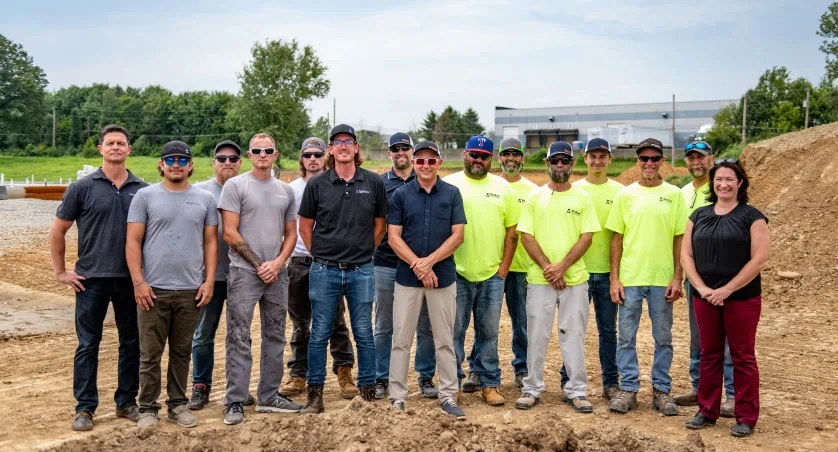 Construction team at worksite group photo